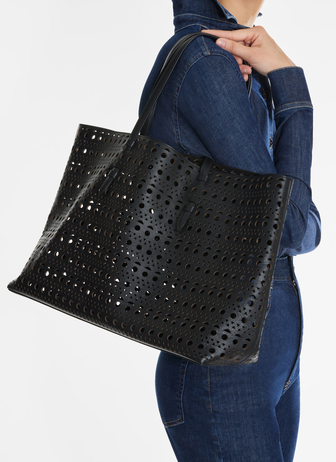 Mina 44 bag in optical perfo lux calfskin ALAÏA BLACK MINA 44 BAG IN OPTICAL PERFO LUX CALFSKIN